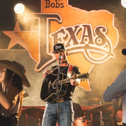 Parker McCollum at Billy Bob's Texas wearing Fresh Western snapback trucker hat in black